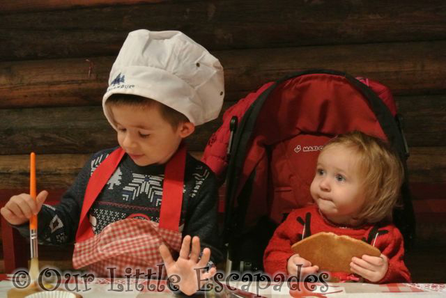 ethan concentrating decorating gingerbread little e watching lapland uk