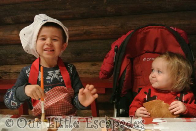 ethan decorating gingerbread little e lapland uk December 2015