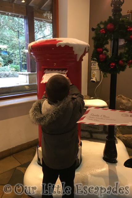 ethan posting letter red postbox