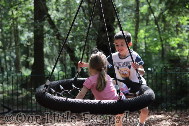 ethan pushing little e swing highwoods country park August 2017