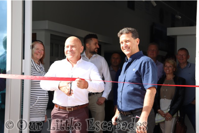 dominic littlewood ribbon cutting seh bac showroom colchester grand opening