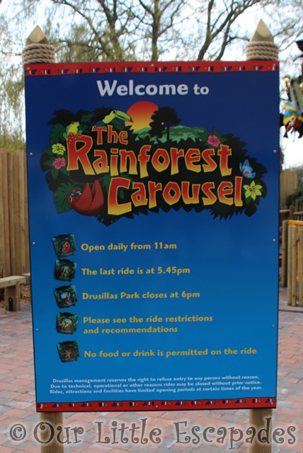 rainforest carousel opening sign drusillas park