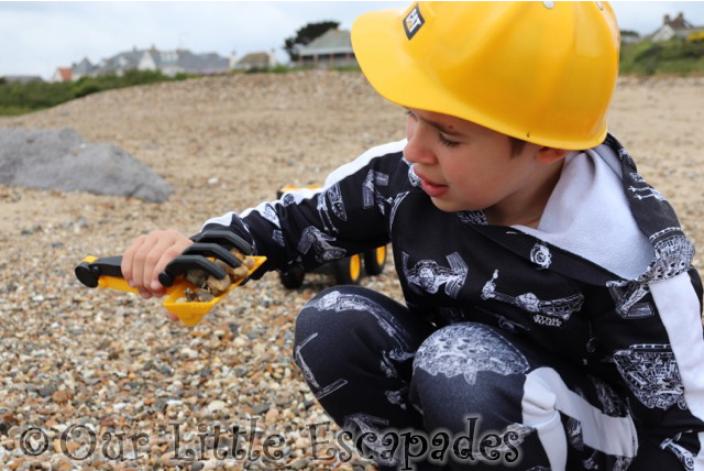 ethan caterpillar hard hat shovel rake