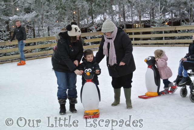 jane grandma ethan ice skating holding penguin support lapland uk superstar day