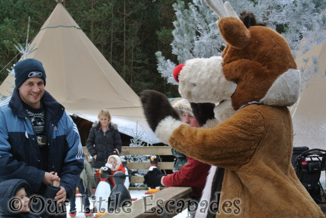 reindeer mascot waving ethan