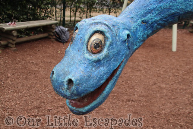 blue dinosaur under sevens play area roarr dinosaur adventure