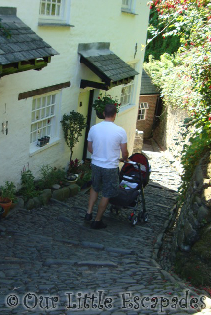 darren pushing pram down steep cobbled street