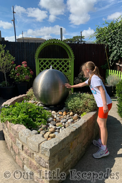 little e touching water feature sensory garden merrivale model village