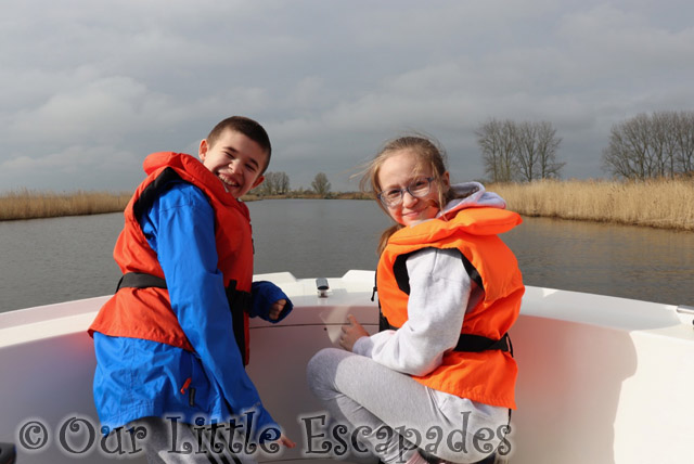 ethan little e sitting front boat norfolk broads project 365 2023