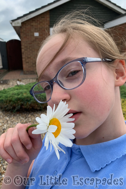 little e holding flower selfie project 365 2023