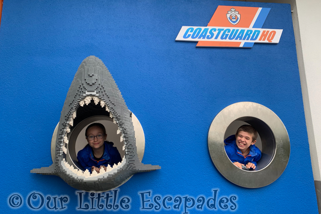 smiling little e lego shark smiling ethan porthole legoland coastguard hq