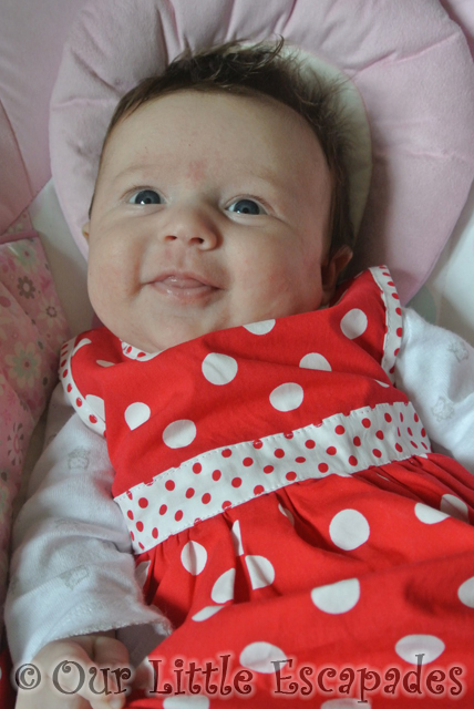 smiling little e red white polka dot dress