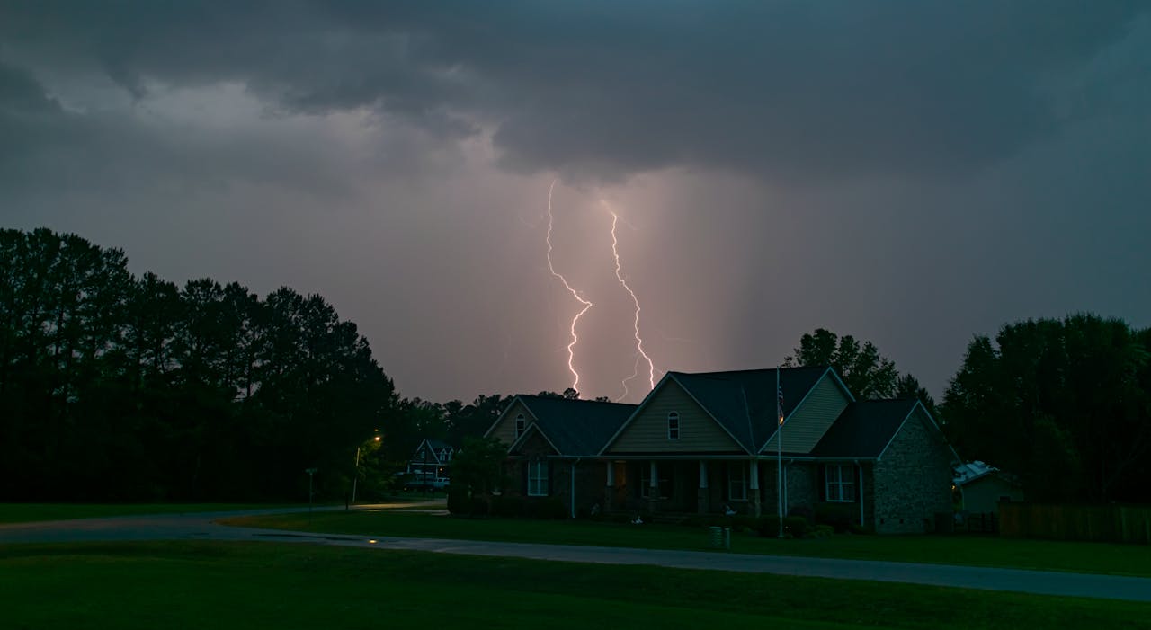 lightnings storms over village